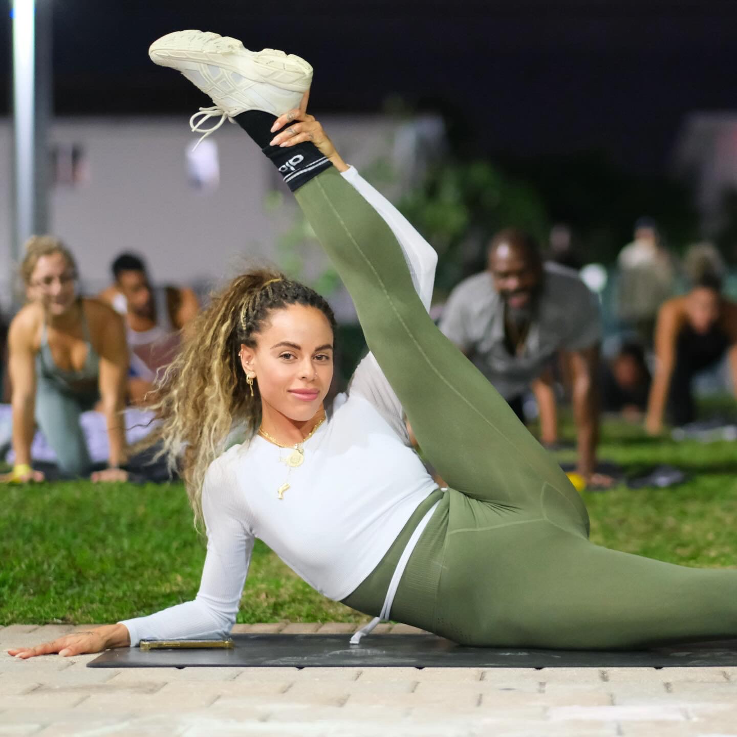 Jungle Johanna teaching mat Pilates class in Miami, FL